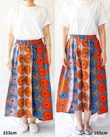 Abu Dhabi Gather Skirt -Flower blooming on concrete-