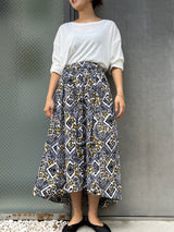 Abu Dhabi Gather Skirt -Flower blooming on concrete-